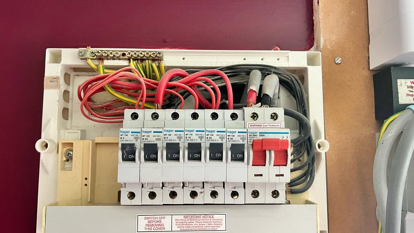 Open Hager consumer unit during an EICR inspection